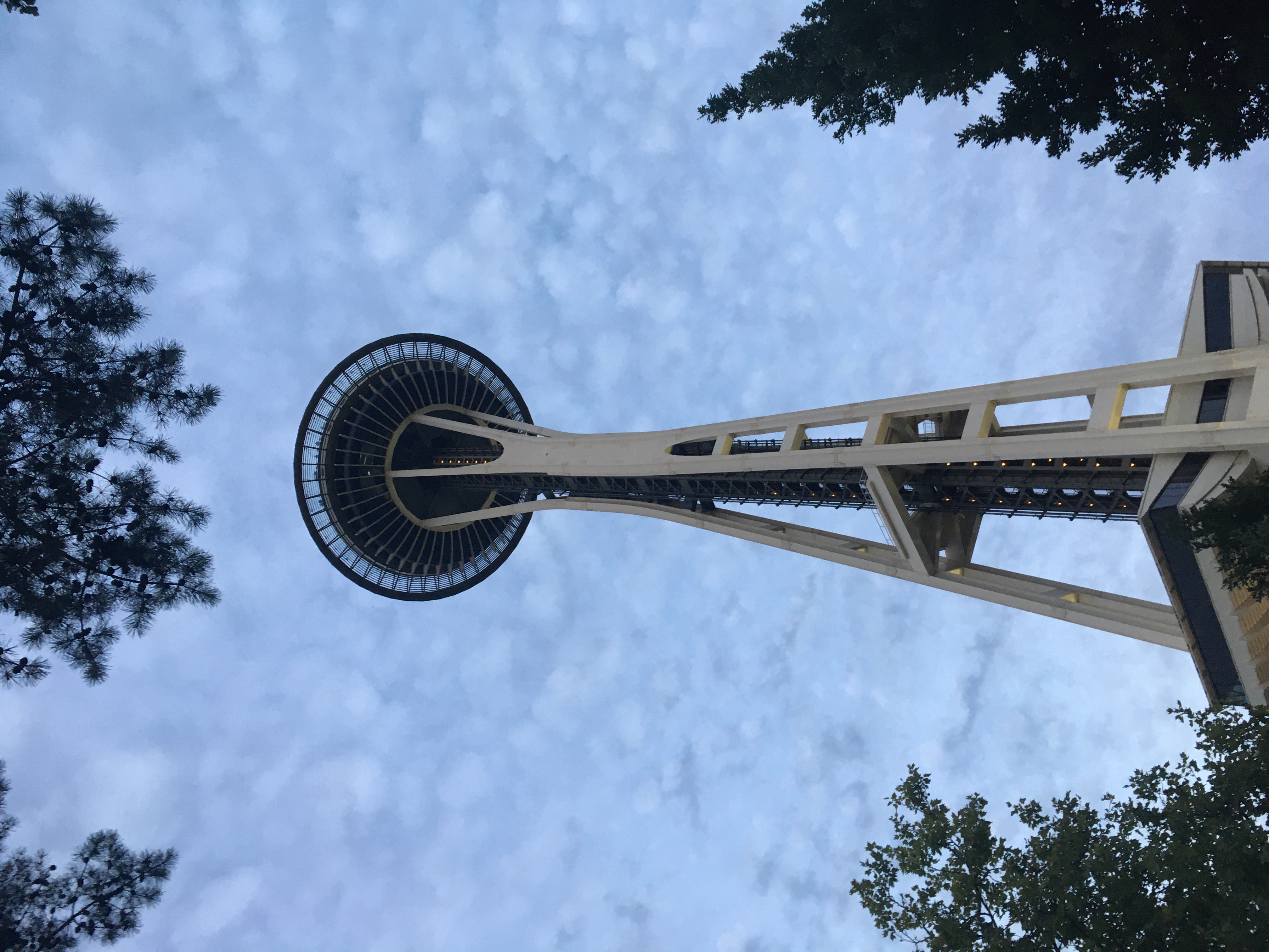 View looking up at the Space Needle tower, from a position near its base