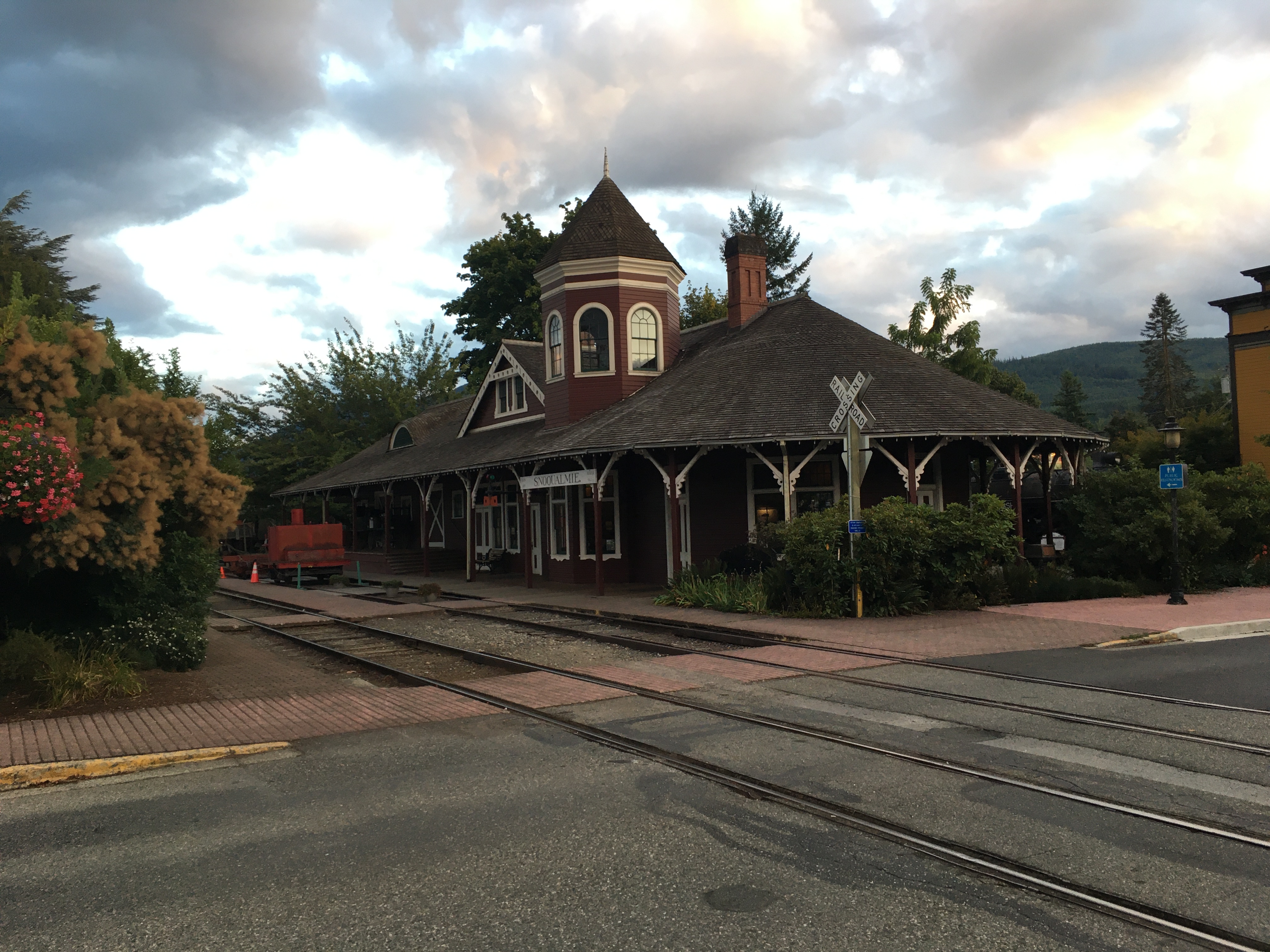 A large, old-fashioned wooden train station